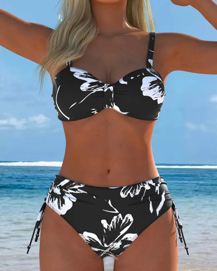Two-piece halter bikini with print.
