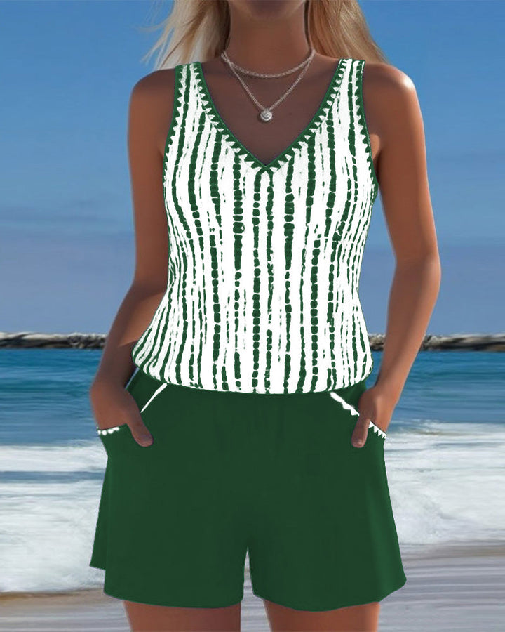 Two-piece swimsuit with print, pockets, and V-neck.