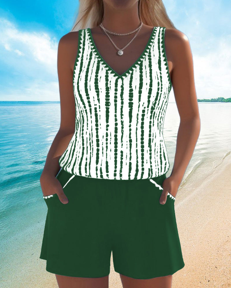 Two-piece swimsuit with print, pockets, and V-neck.