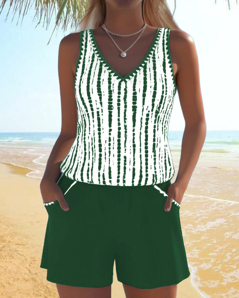 Two-piece swimsuit with print, pockets, and V-neck.