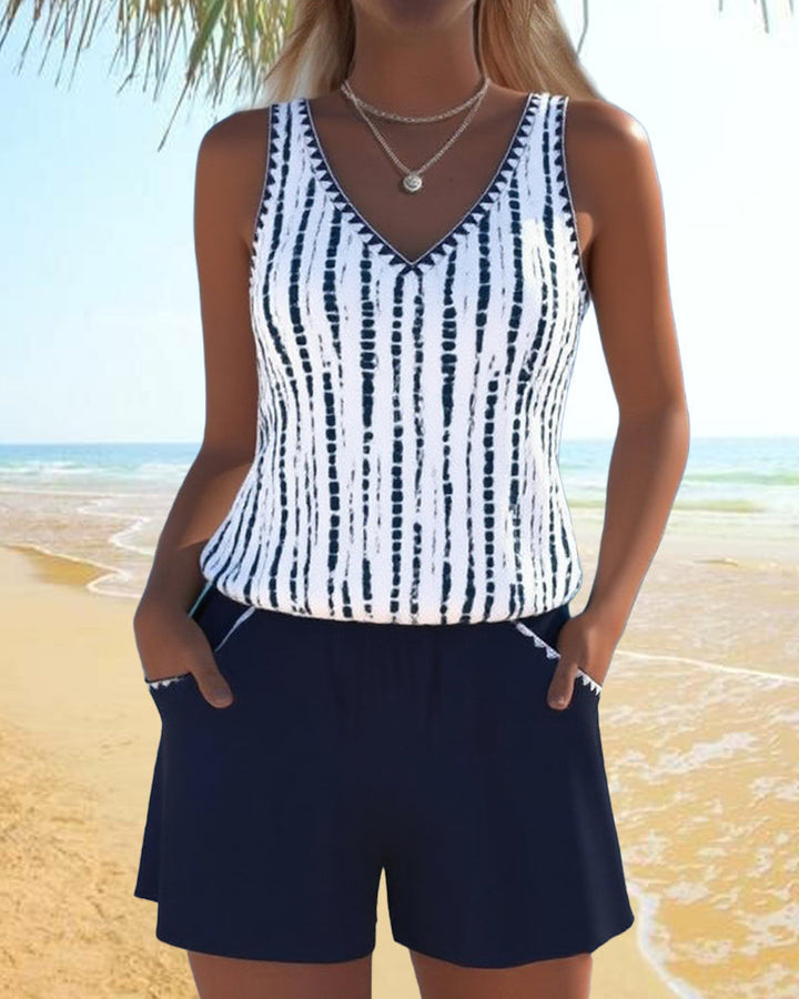 Two-piece swimsuit with print, pockets, and V-neck.
