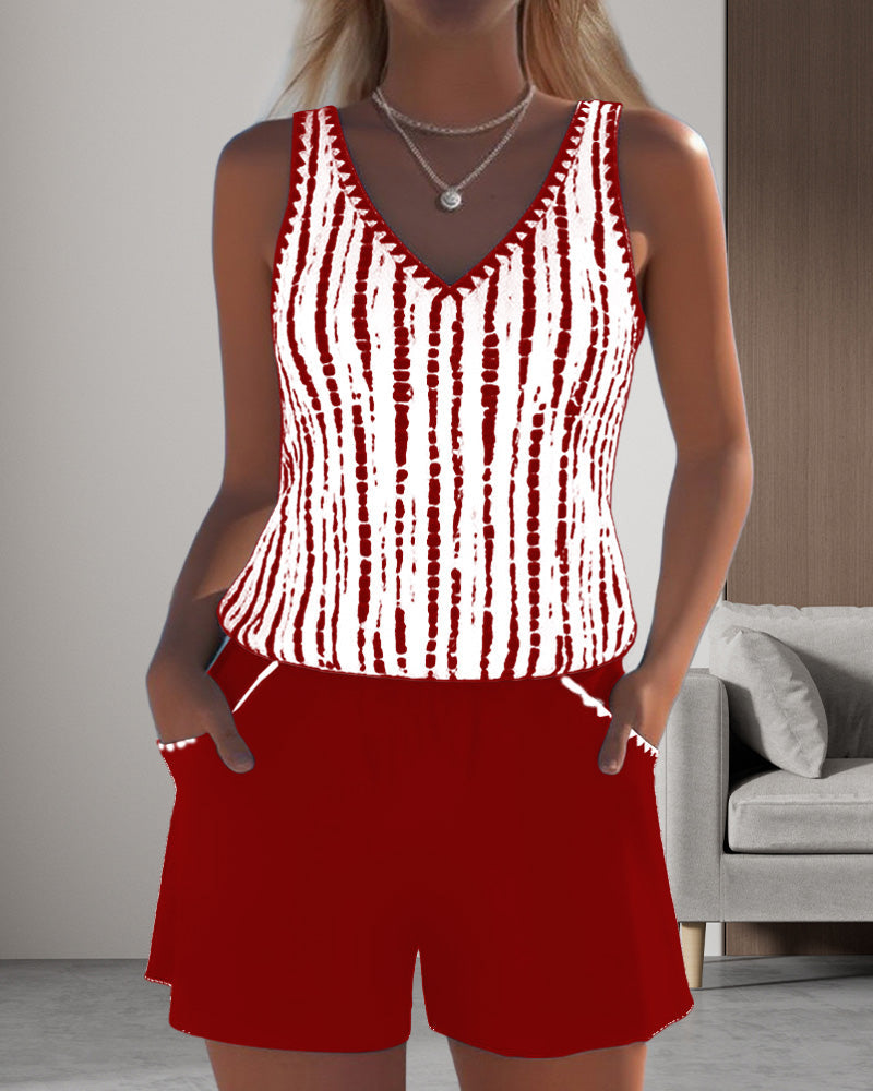 Two-piece swimsuit with print, pockets, and V-neck.