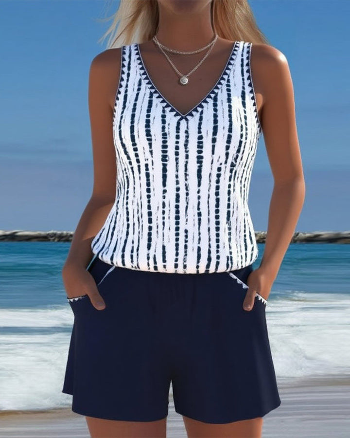 Two-piece swimsuit with print, pockets, and V-neck.