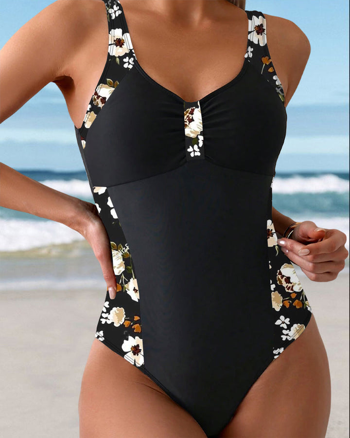 Sleeveless swimsuit with print and contrasting details